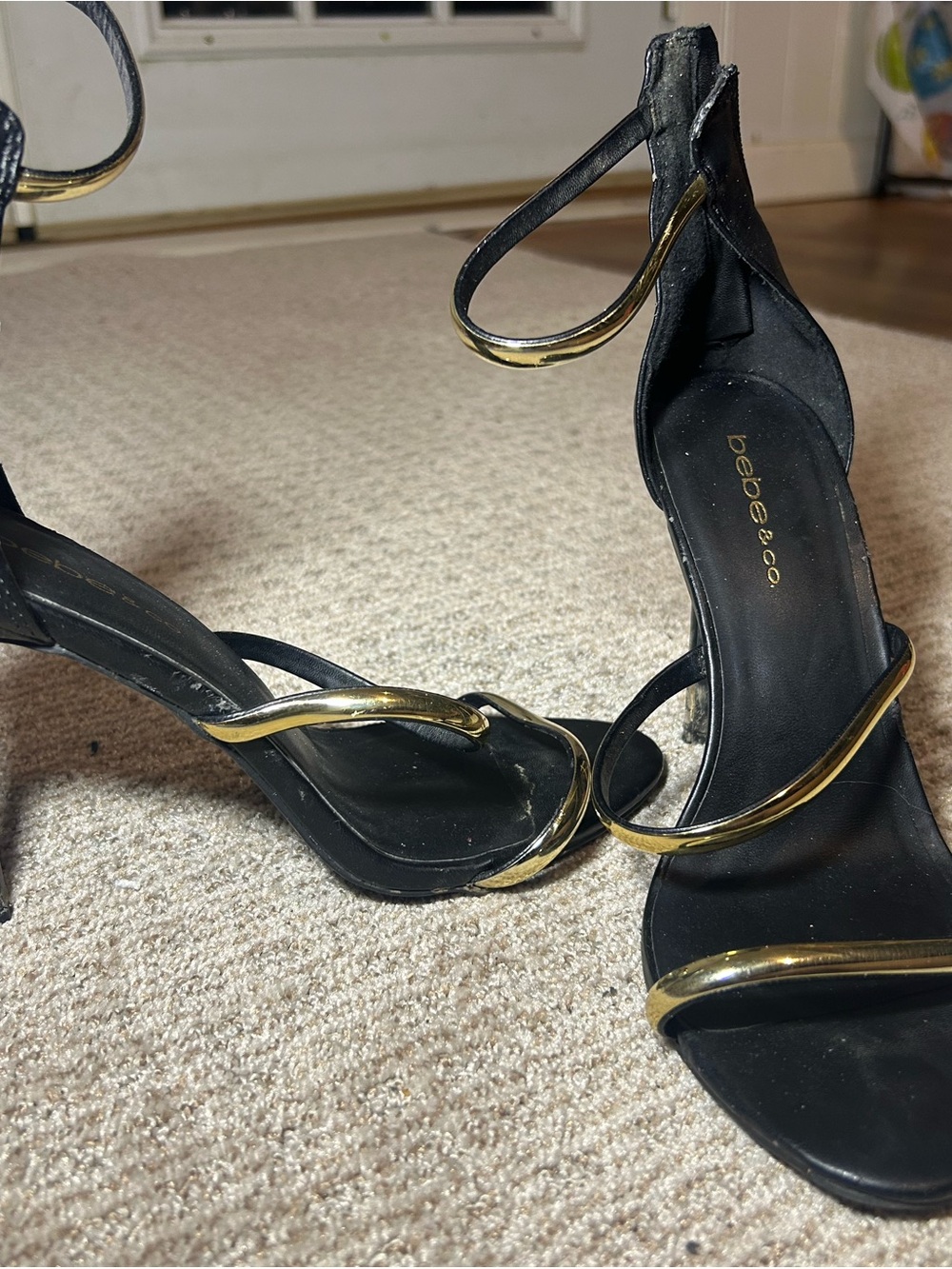 bebe Black Heeled Sandals with Gold Trim